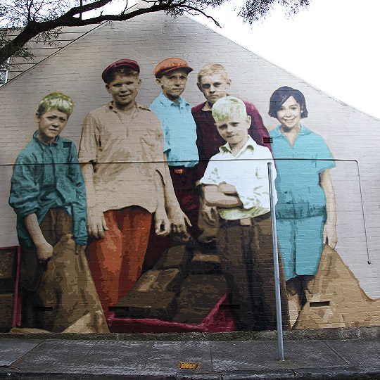 A wall displaying a public artwork - a full audio and text description is given on this page.